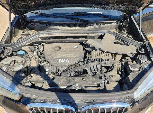 WBXHT3Z37G4A51304 2016 BMW X1 Black Սալոնի հետևի տեսք