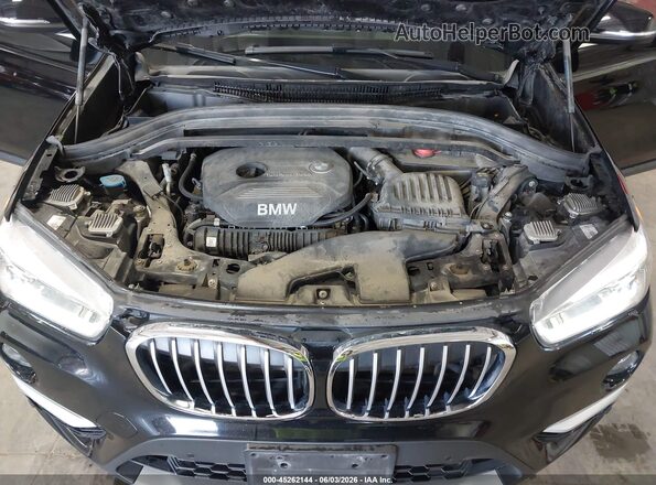 WBXHT3Z37H4A55547 2017 BMW X1 Black Rear view