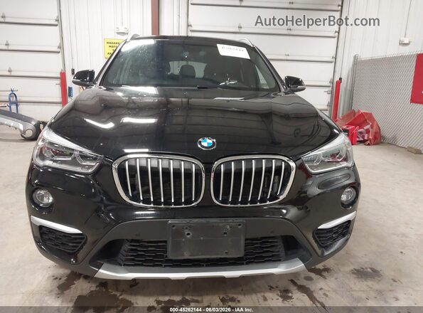 WBXHT3Z37H4A55547 2017 BMW X1 Black Rear interior view