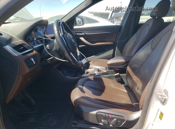 WBXHT3Z38G4A51831 2016 BMW X1 White Widok wnętrza z przodu