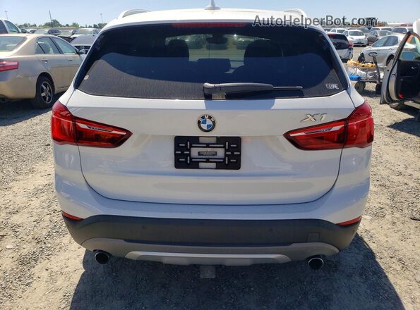 WBXHT3Z38G4A51831 2016 BMW X1 White Widok z tyłu
