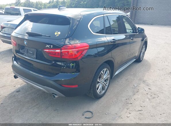 WBXHT3Z38H4A57002 2017 BMW X1 Black Tył prawy