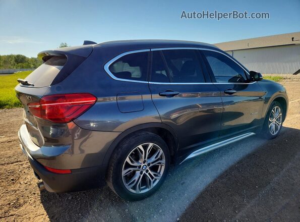 WBXHT3Z39H4A54304 2017 BMW X1 Gray 