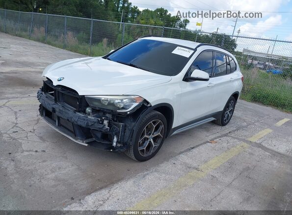 WBXHU7C30H5H37709 2017 BMW X1 White Առջևի ձախ երեք քառորդ տեսարան