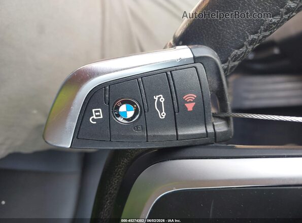 WBXHU7C31H5H37699 2017 BMW X1 Gray Առջևի վահանակի տեսք