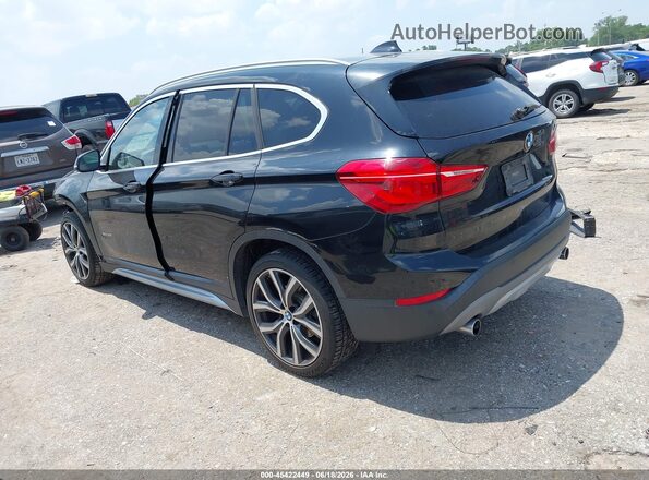 WBXHU7C33H5H37381 2017 BMW X1 Black Rear left