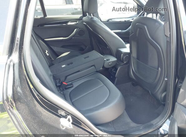 WBXHU7C33H5H37381 2017 BMW X1 Black VIN sticker view