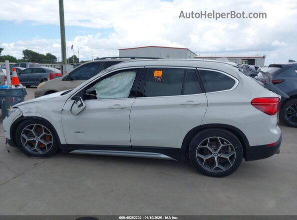 WBXHU7C34H5H35476 2017 BMW X1 White Rear interior view
