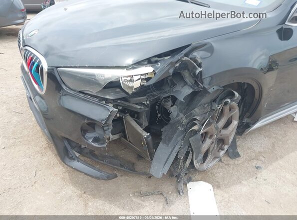 WBXHU7C37J5L05931 2018 BMW X1 Black Դիմացի տեսք