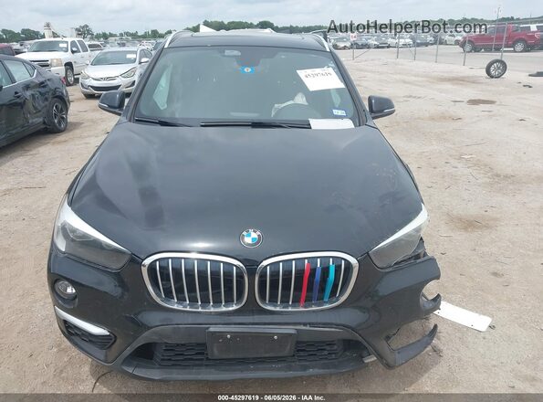 WBXHU7C37J5L05931 2018 BMW X1 Black Սարքավորումների վահանակի տեսք