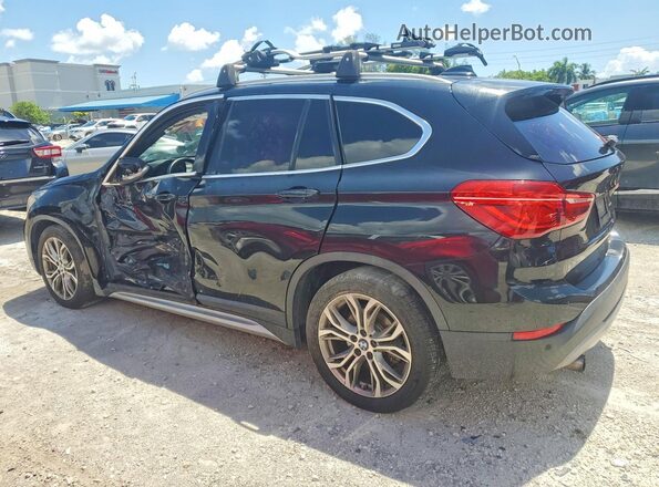 WBXHU7C38H5H37568 2017 BMW X1 Black Rear left