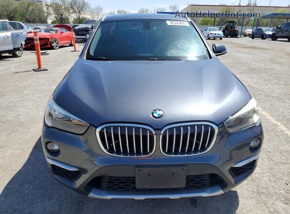 WBXHU7C39H5H34033 2017 BMW X1 Gray Դիմացի տեսք