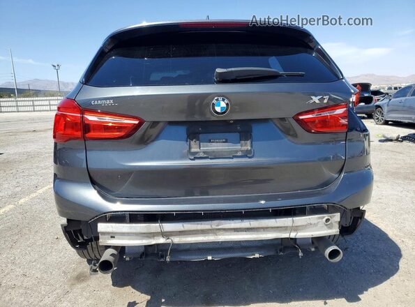 WBXHU7C39H5H34033 2017 BMW X1 Gray Հետևի տեսք