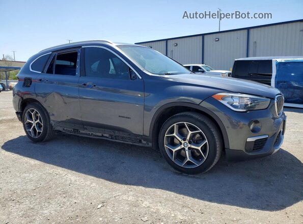WBXHU7C39H5H34033 2017 BMW X1 Gray Առջևի աջ