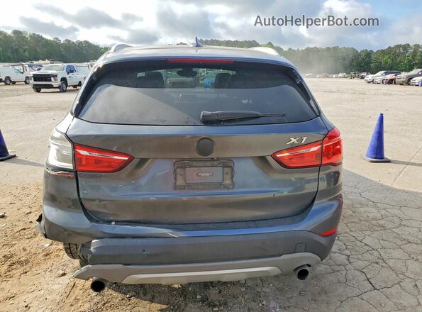 WBXHU7C39H5H35280 2017 BMW X1 Gray Vista trasera