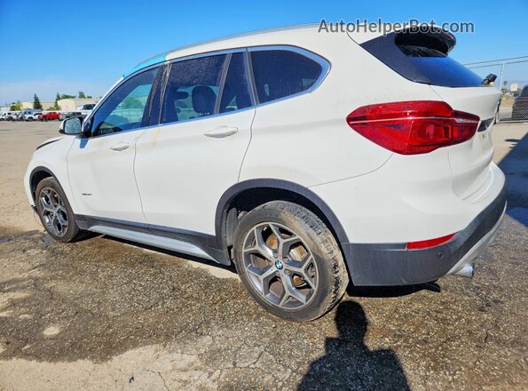 WBXHU7C39H5H36669 2017 BMW X1 White Tył lewy