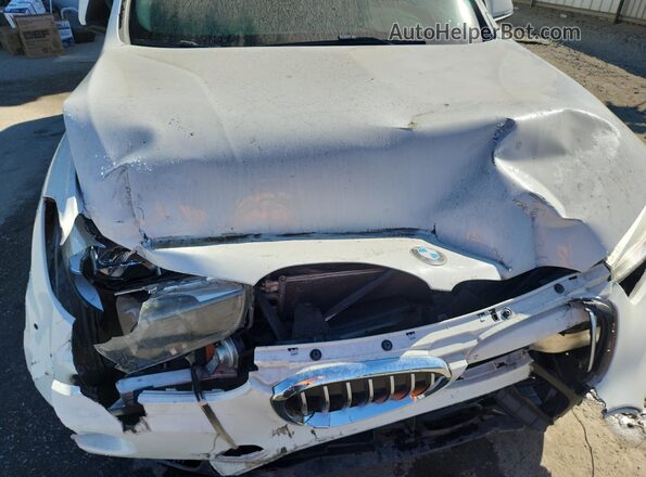 WBXHU7C39H5H36669 2017 BMW X1 White Widok naklejki z numerem VIN