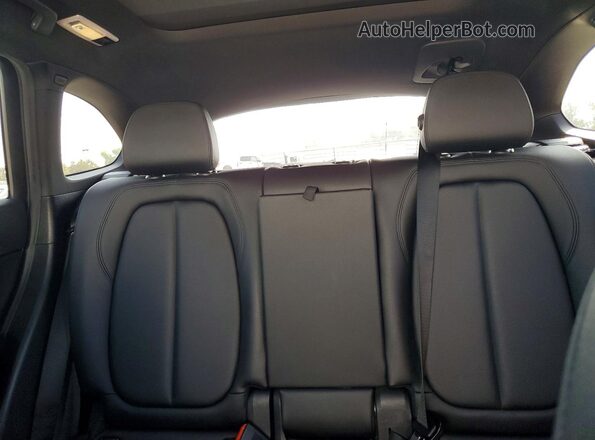 WBXHU7C39J5H39769 2018 BMW X1 White Rear seats view