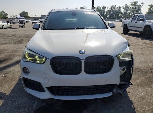 WBXHU7C39J5H39769 2018 BMW X1 White Front view