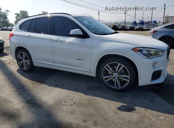 WBXHU7C39J5H39769 2018 BMW X1 White Front right