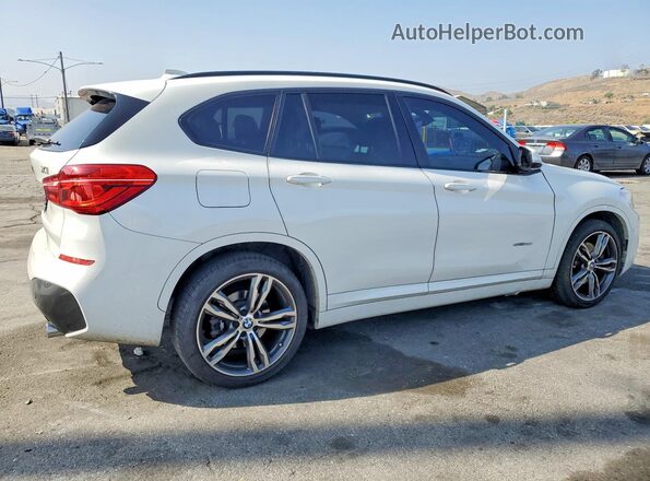 WBXHU7C39J5H39769 2018 BMW X1 White Rear right