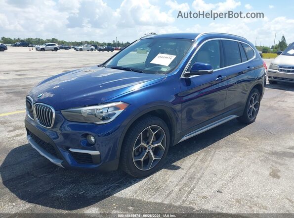 WBXHU7C39J5L08538 2018 BMW X1 Синий Передняя левая четверть