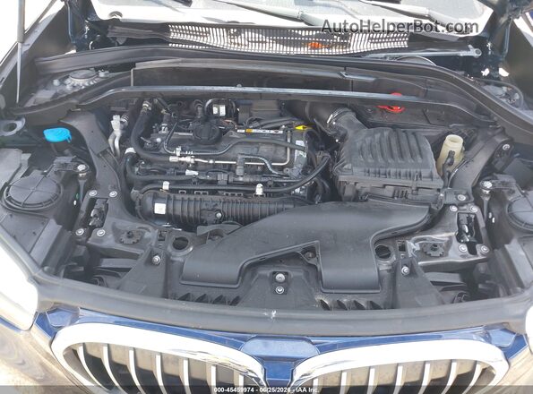 WBXHU7C39J5L08538 2018 BMW X1 Синий Вид сзади