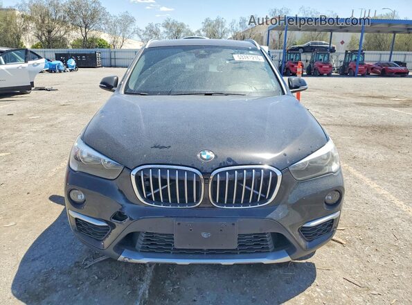 WBXHU7C50K3H46642 2019 BMW X1 Black Widok z przodu