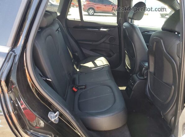 WBXHU7C50K3H46642 2019 BMW X1 Black Widok wnętrza z tyłu