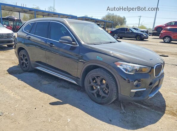 WBXHU7C50K3H46642 2019 BMW X1 Black Przód prawy