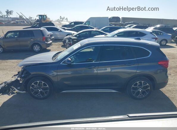 WBXJG7C00M5U22978 2021 BMW X1 Gray Vista interior de 360 grados