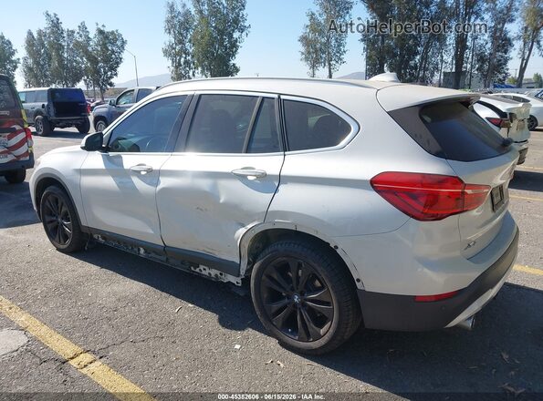 WBXJG7C02L5P85457 2020 BMW X1 White Trasero izquierdo