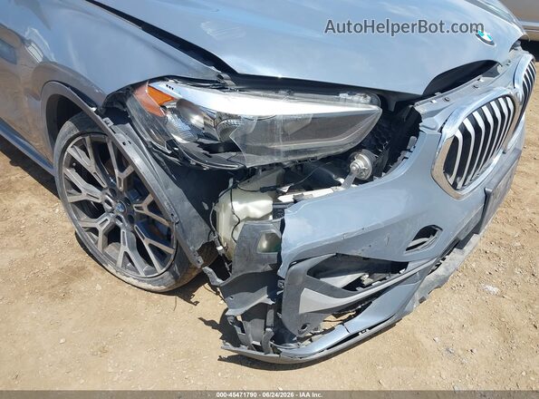 WBXJG7C02M5S56317 2021 BMW X1 Синий Вид спереди