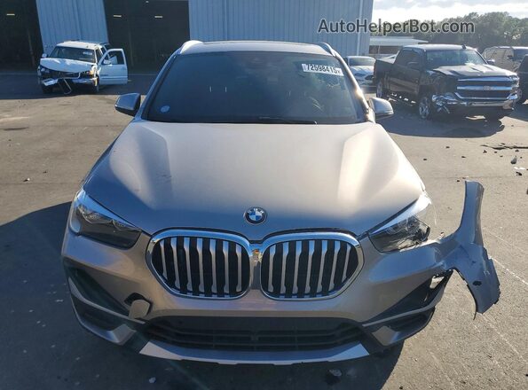 WBXJG7C05M5S14918 2021 BMW X1 Gold Vista frontal
