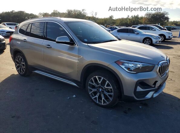 WBXJG7C05M5S14918 2021 BMW X1 Gold Delantero derecho