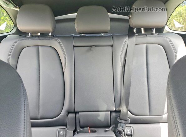 WBXJG7C06L5R36638 2020 BMW X1 Blue Հետևի նստատեղերի տեսք