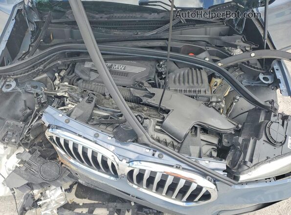 WBXJG7C06L5R36638 2020 BMW X1 Blue Շարժիչի բաժամունքի տեսք