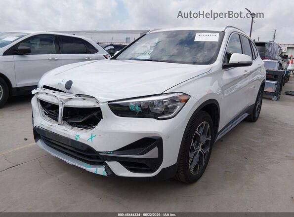 WBXJG7C07M3M65581 2021 BMW X1 White წინა მარცხენა ხედი სამი მეოთხედიდან
