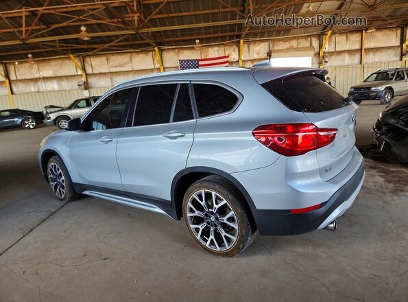 WBXJG7C09L3L90624 2020 BMW X1 Silver Rear left