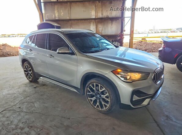 WBXJG7C09L3L90624 2020 BMW X1 Silver Front right