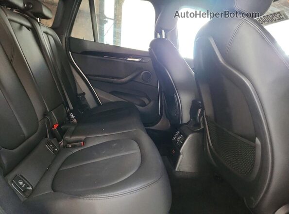 WBXJG7C09L3L90624 2020 BMW X1 Silver Rear interior view