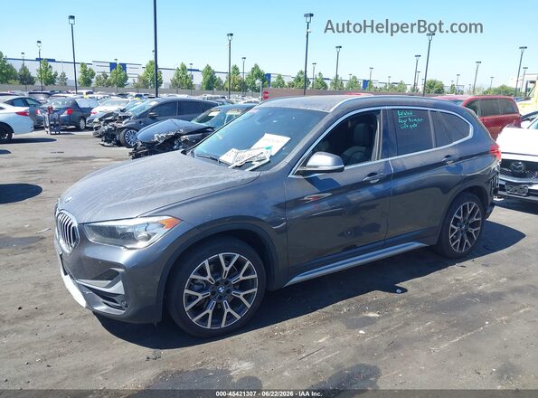 WBXJG7C09M5S53575 2021 BMW X1 Gray Սալոնի 360 աստիճան տեսք