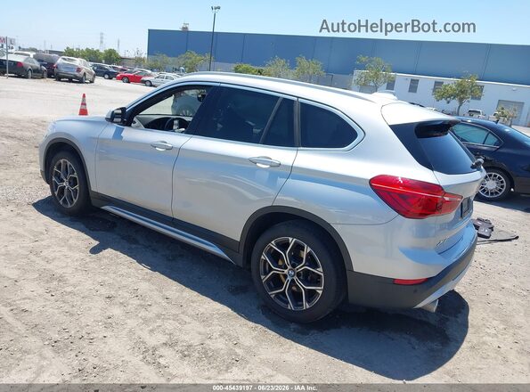 WBXJG7C09M5S82073 2021 BMW X1 Серебряный Задняя левая четверть