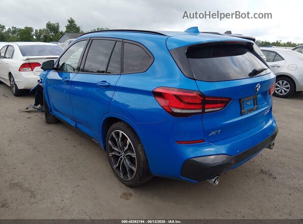 WBXJG9C01M5T65959 2021 BMW X1 Blue Trasero izquierdo