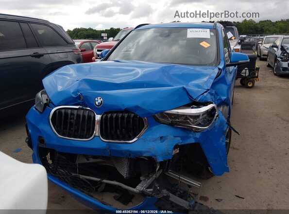 WBXJG9C01M5T65959 2021 BMW X1 Blue Vista del cuadro de instrumentos