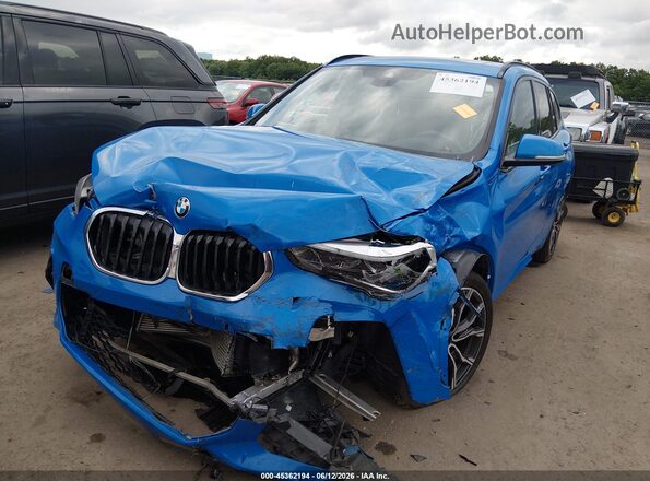 WBXJG9C01M5T65959 2021 BMW X1 Blue Vista frontal