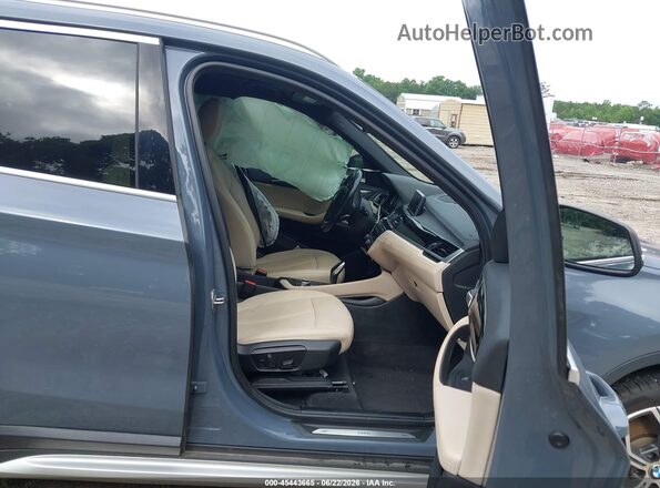 WBXJG9C02L5P70419 2020 BMW X1 Серый Вид салона спереди
