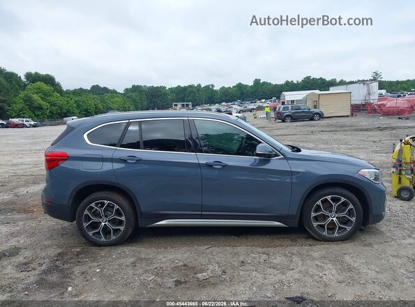 WBXJG9C02L5P70419 2020 BMW X1 Серый Вид задней части салона