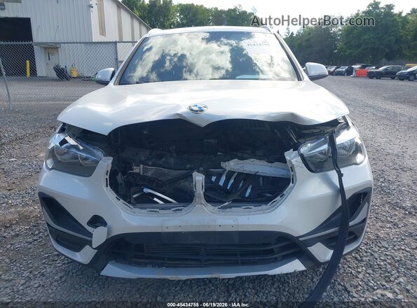 WBXJG9C02L5R84939 2020 BMW X1 White Instrument cluster view