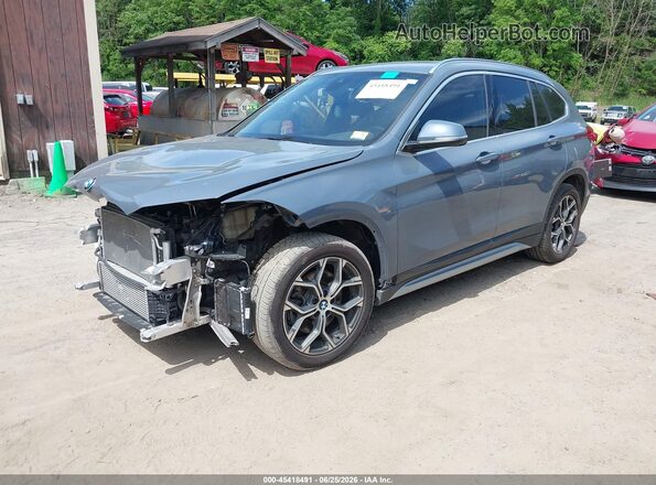 WBXJG9C07M5S06363 2021 BMW X1 Blue Առջևի ձախ երեք քառորդ տեսարան